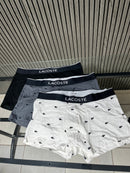 PACK COM TRÊS CUECAS LACOSTE TRUNK EM ALGODÃO COM ELASTANO E LOGO NO CÓS